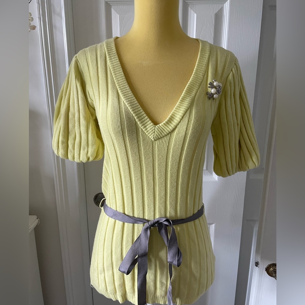 Unique twelve by twelve top with broach